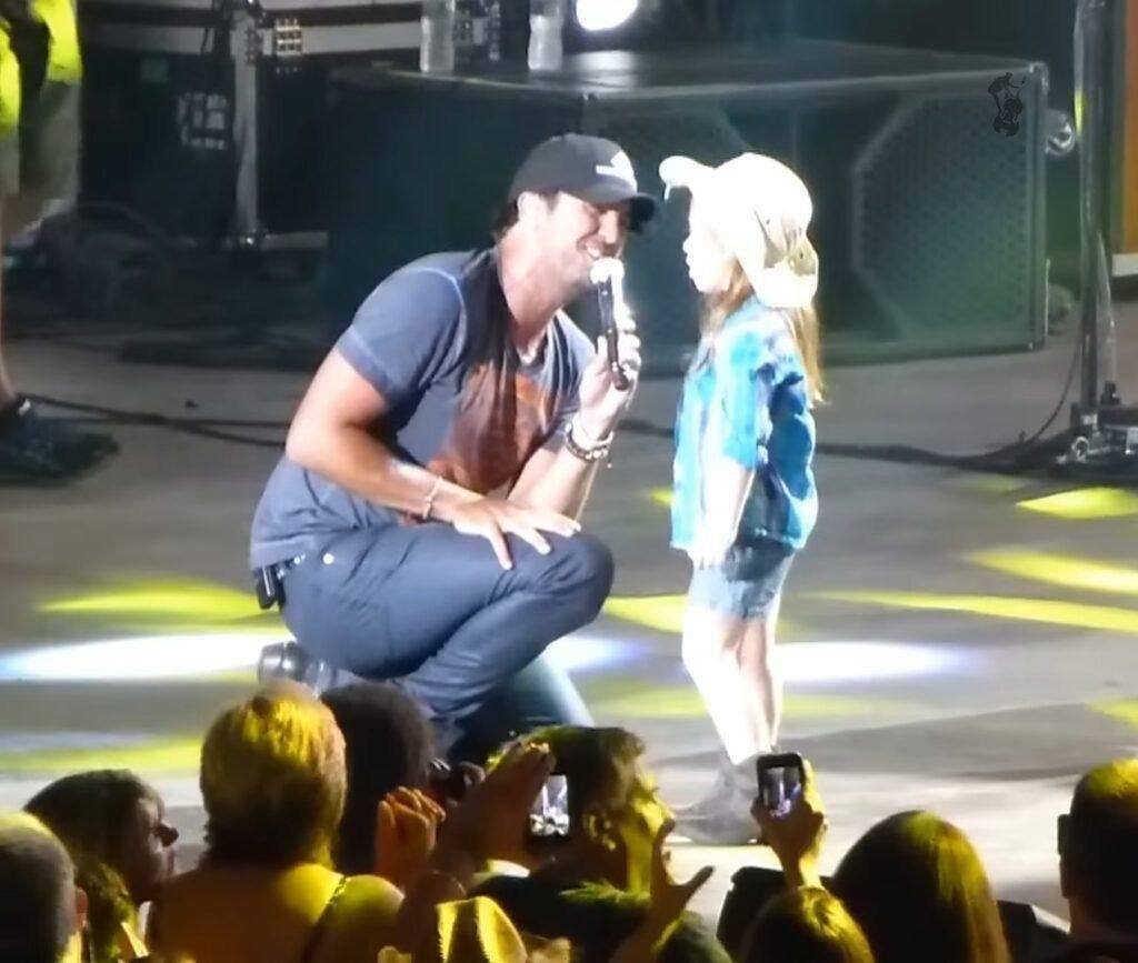 Luke Bryan Joined by Enthusiastic Young, Fan Onstage Who Sings Along to Every Word!..